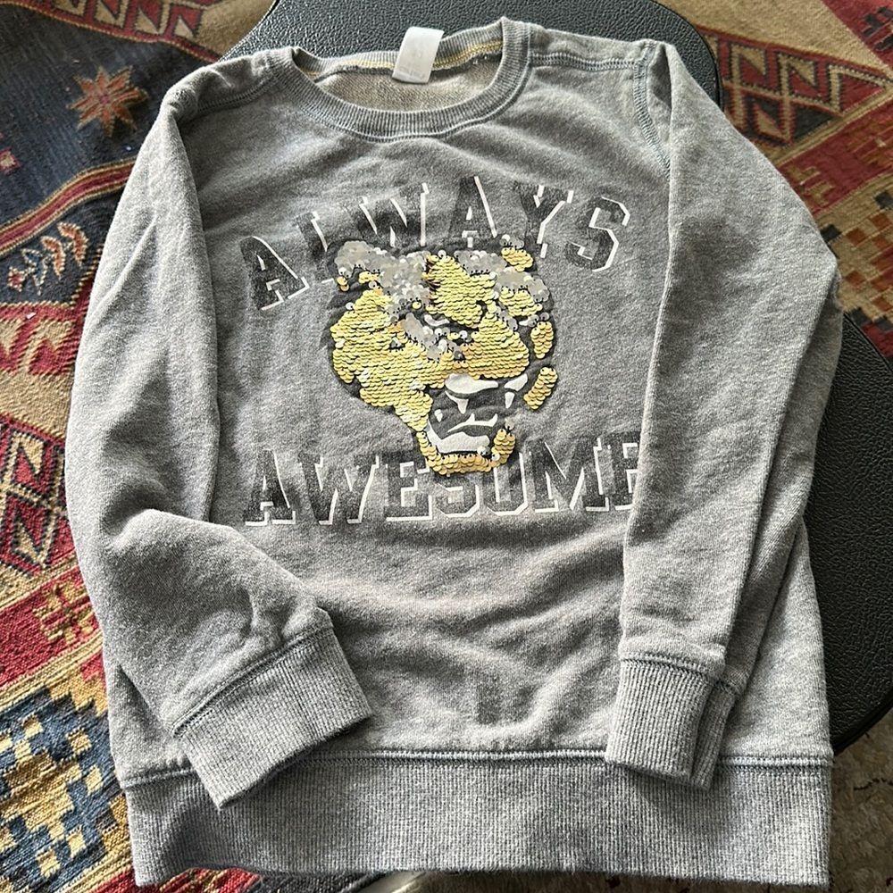 Gray sweatshirt with silver and gold lion/big cat logo - Always Awesome print